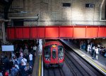 Big crowds at Paddington's Metropolitan Railway Station 